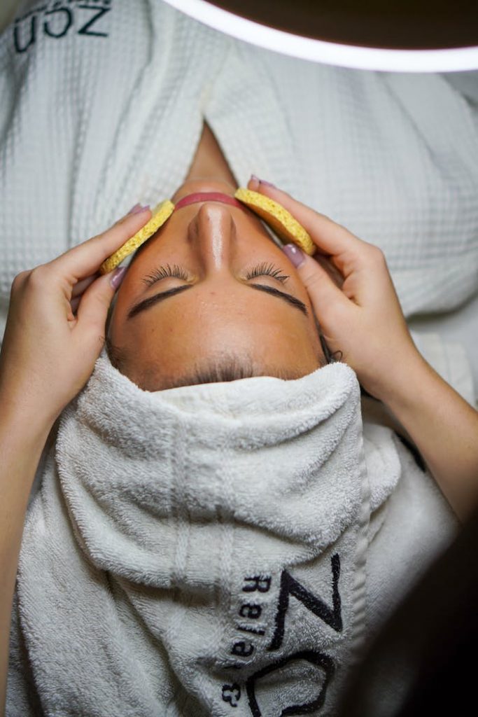 pexels-photo-3212164 Relaxing spa treatment with facial and sponge massage in a serene environment.