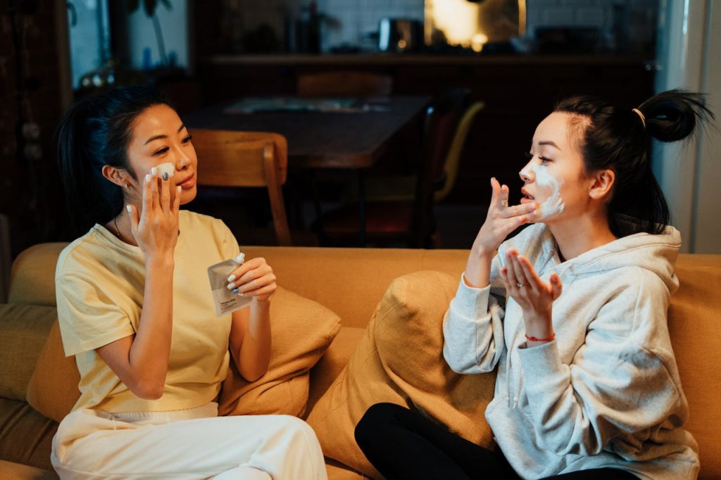 pexels-photo-4004461 Two friends enjoy a relaxing skincare session at home, enhancing their beauty routines together.